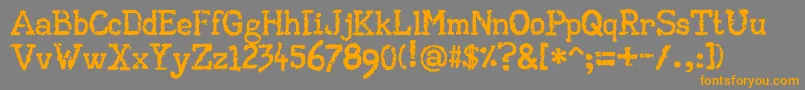 AaTypewriter Font – Orange Fonts on Gray Background