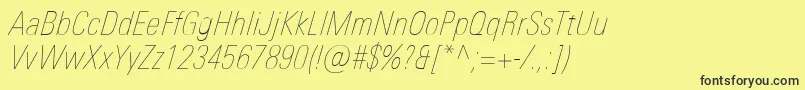 Шрифт UniversNextProUltralightCondensedItalic – чёрные шрифты на жёлтом фоне
