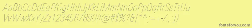 Шрифт UniversNextProUltralightCondensedItalic – серые шрифты на жёлтом фоне