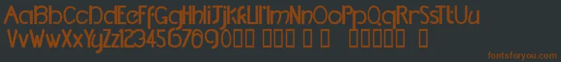 TmDccNormal Font – Brown Fonts on Black Background