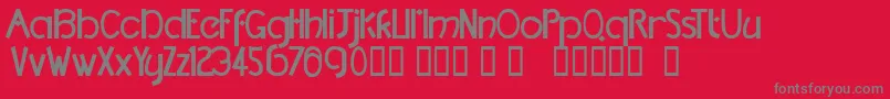 TmDccNormal-Schriftart – Graue Schriften auf rotem Hintergrund