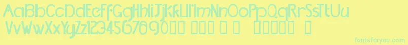 TmDccNormal Font – Green Fonts on Yellow Background