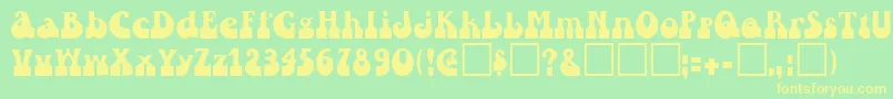 IvannaRegular Font – Yellow Fonts on Green Background