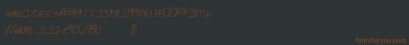 Freekittenz Font – Brown Fonts on Black Background