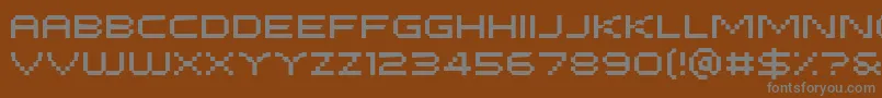 Fonte PfTempestaFiveExtended – fontes cinzas em um fundo marrom
