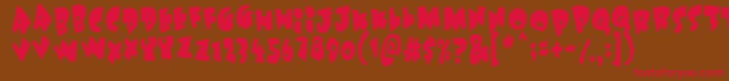 フォントUnderattack – 赤い文字が茶色の背景にあります。