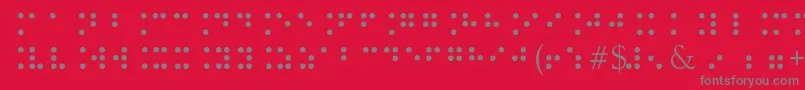 BrailleType-Schriftart – Graue Schriften auf rotem Hintergrund