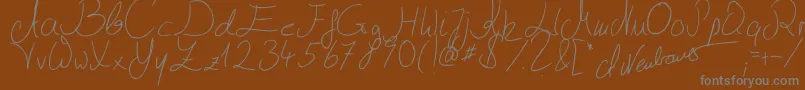 Шрифт Julliscriptum2 – серые шрифты на коричневом фоне