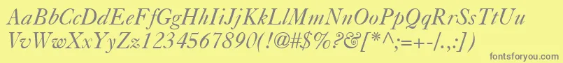 Шрифт CasablancaItalic – серые шрифты на жёлтом фоне