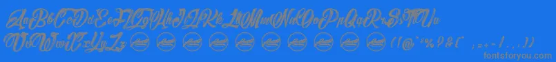 BarryKadesPersonaluseonly-fontti – harmaat kirjasimet sinisellä taustalla