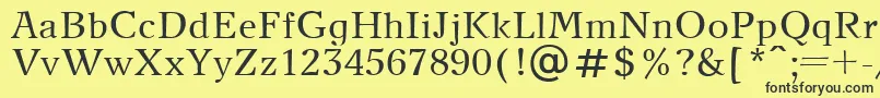 NewJournalPlain Font – Black Fonts on Yellow Background