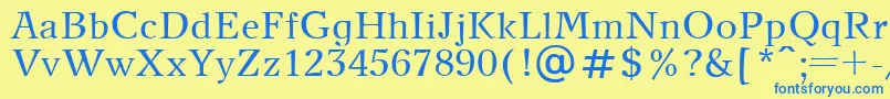 NewJournalPlain Font – Blue Fonts on Yellow Background