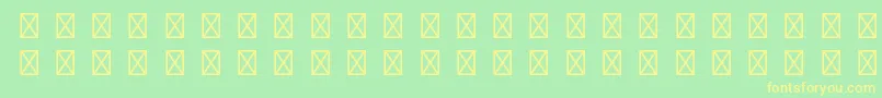 フォントCaravanltstd4 – 黄色の文字が緑の背景にあります