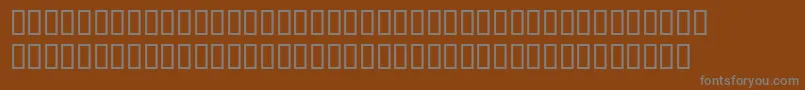 Emgravessh Font – Gray Fonts on Brown Background