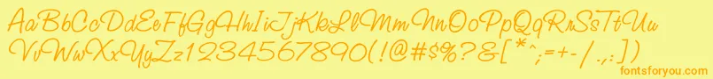 フォントStudioscriptttt – オレンジの文字が黄色の背景にあります。