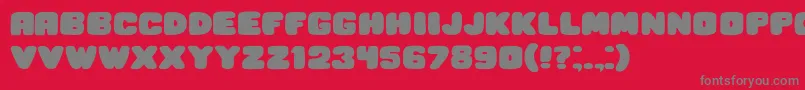 フォントHesitation – 赤い背景に灰色の文字