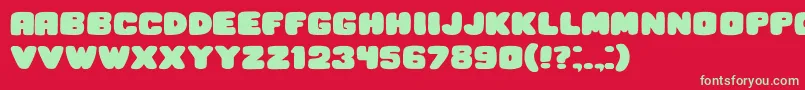 フォントHesitation – 赤い背景に緑の文字