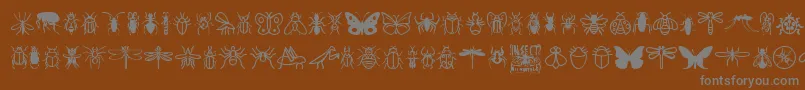 Fonte InsectIcons – fontes cinzas em um fundo marrom