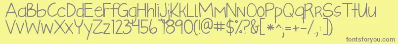 Kglikeaskyscraper Font – Gray Fonts on Yellow Background