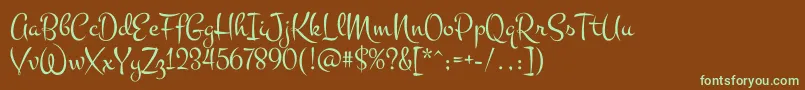 フォントMontezRegular – 緑色の文字が茶色の背景にあります。