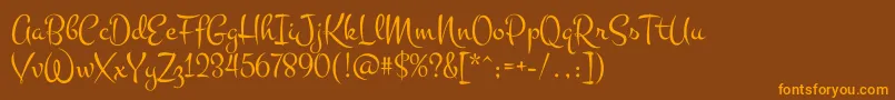 MontezRegular-Schriftart – Orangefarbene Schriften auf braunem Hintergrund