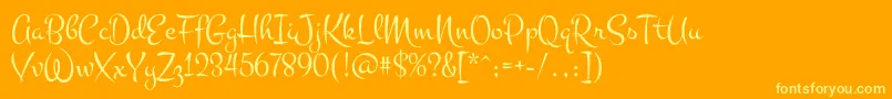 MontezRegular Font – Yellow Fonts on Orange Background