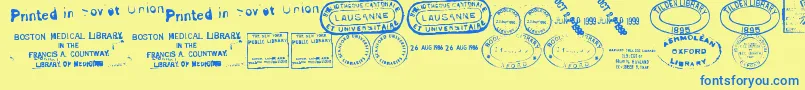 OldSealsTfb-Schriftart – Blaue Schriften auf gelbem Hintergrund