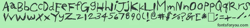 フォントOkcok – 緑の背景に黒い文字