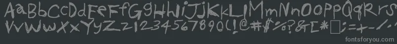 フォントOkcok – 黒い背景に灰色の文字