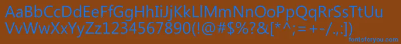 Czcionka MicrosoftPhagspa – niebieskie czcionki na brązowym tle