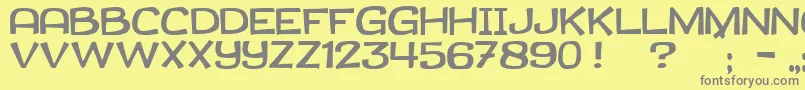 JmhCanasta-Schriftart – Graue Schriften auf gelbem Hintergrund