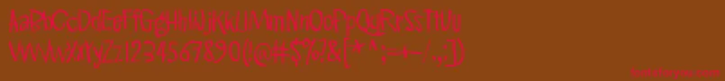 PinkKangaroo-Schriftart – Rote Schriften auf braunem Hintergrund