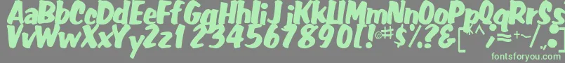 FatRegularTtstd Font – Green Fonts on Gray Background