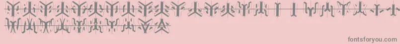 Duplosketchesplus-Schriftart – Graue Schriften auf rosa Hintergrund