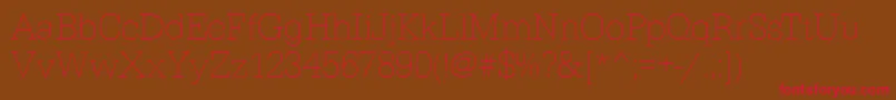 EgyptiennestdXlightRegular Font – Red Fonts on Brown Background