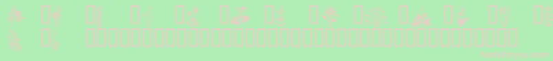 フォントWildflowers1 – 緑の背景にピンクのフォント