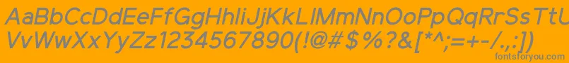 Czcionka ElliotsansMediumitalic – szare czcionki na pomarańczowym tle
