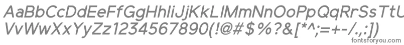ElliotsansMediumitalic-fontti – harmaat kirjasimet valkoisella taustalla