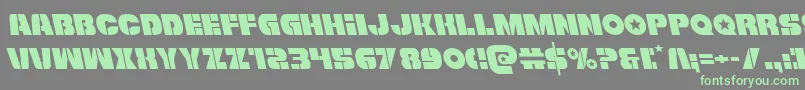 Freedomfighterleft-Schriftart – Grüne Schriften auf grauem Hintergrund