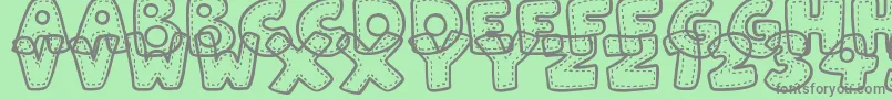 PatchworkStitchlings Font – Gray Fonts on Green Background