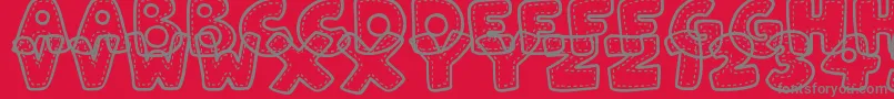 Police PatchworkStitchlings – polices grises sur fond rouge