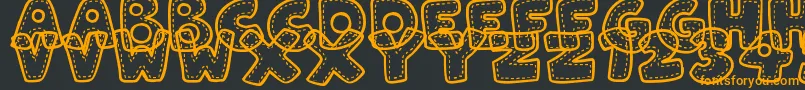 PatchworkStitchlings Font – Orange Fonts on Black Background