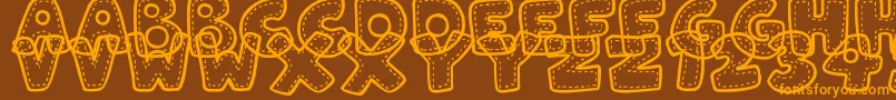 PatchworkStitchlings Font – Orange Fonts on Brown Background