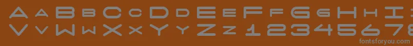 フォント7daysfat – 茶色の背景に灰色の文字