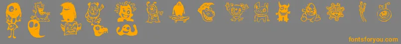 HappyMonsters-fontti – oranssit fontit harmaalla taustalla