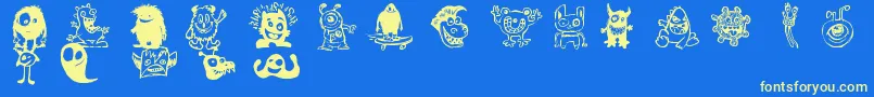 Czcionka HappyMonsters – żółte czcionki na niebieskim tle