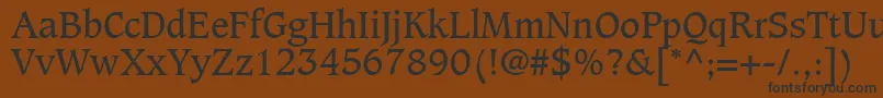 フォントGrammateusSsi – 黒い文字が茶色の背景にあります