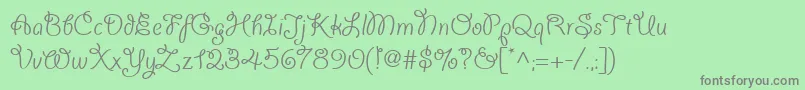 フォントGiddyupWeb – 緑の背景に灰色の文字