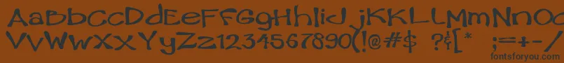 フォントHam – 黒い文字が茶色の背景にあります