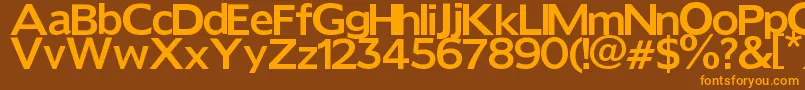 フォントReforma – オレンジ色の文字が茶色の背景にあります。